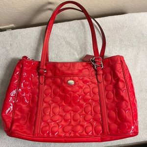 coach red embossed purse